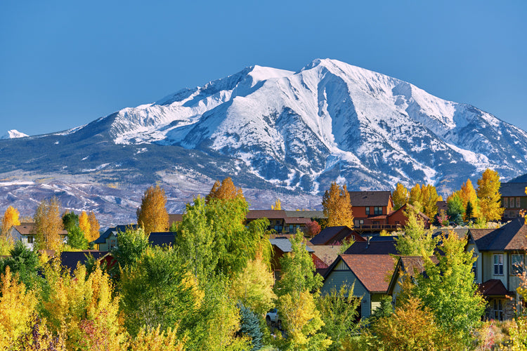 Mountain town with autumn foliage