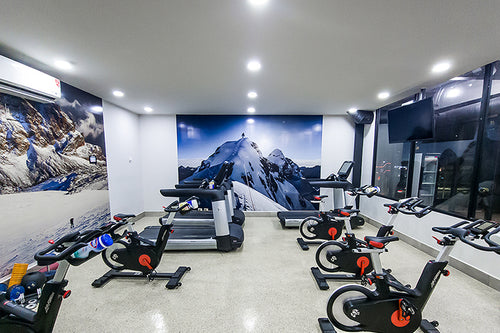 Altitude training gym filled with workout equipment