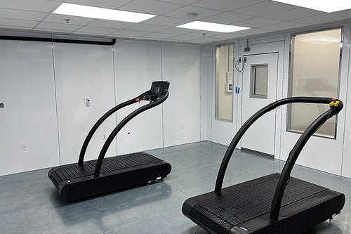 Inside view of environmental chamber with two treadmills