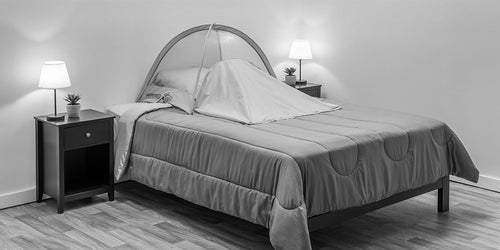 Altitude tent set up on a bed in a bedroom