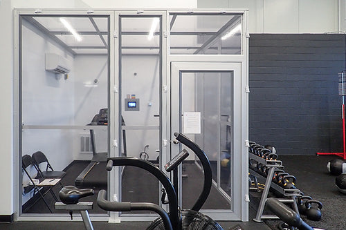 Modular altitude chamber with workout equipment inside