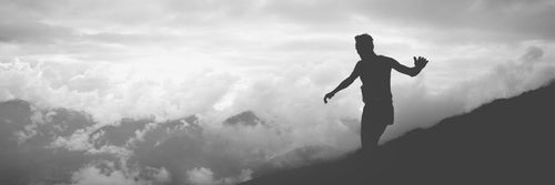 Trail runner high in the mountains