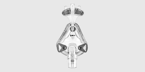 A transparent, medical-grade full face mask with headgear connections, possibly for CPAP or oxygen delivery, shown on a neutral background.