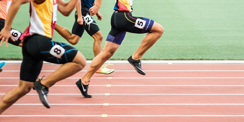 Runners racing on a track